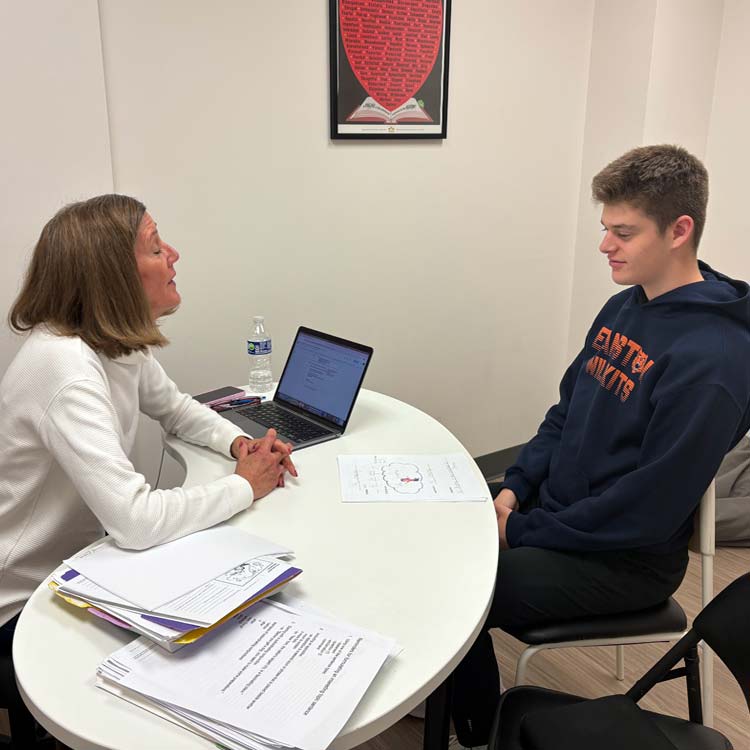 Comprehensive SLP's Jan Schwanke working with a client.